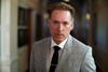 a man wearing a suit and tie